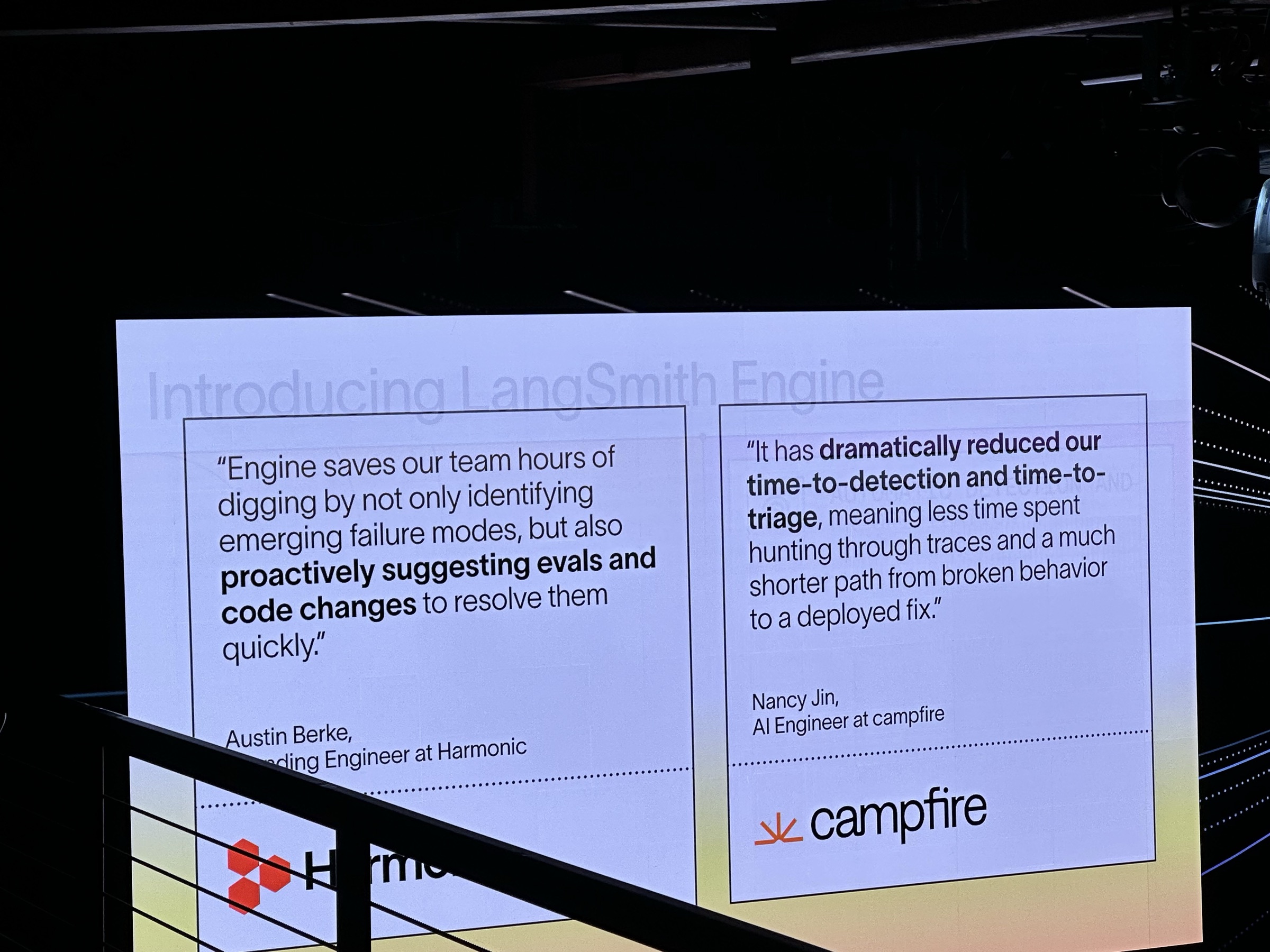 Keynote slide: Introducing LangSmith Engine, with customer quotes from Harmonic and campfire