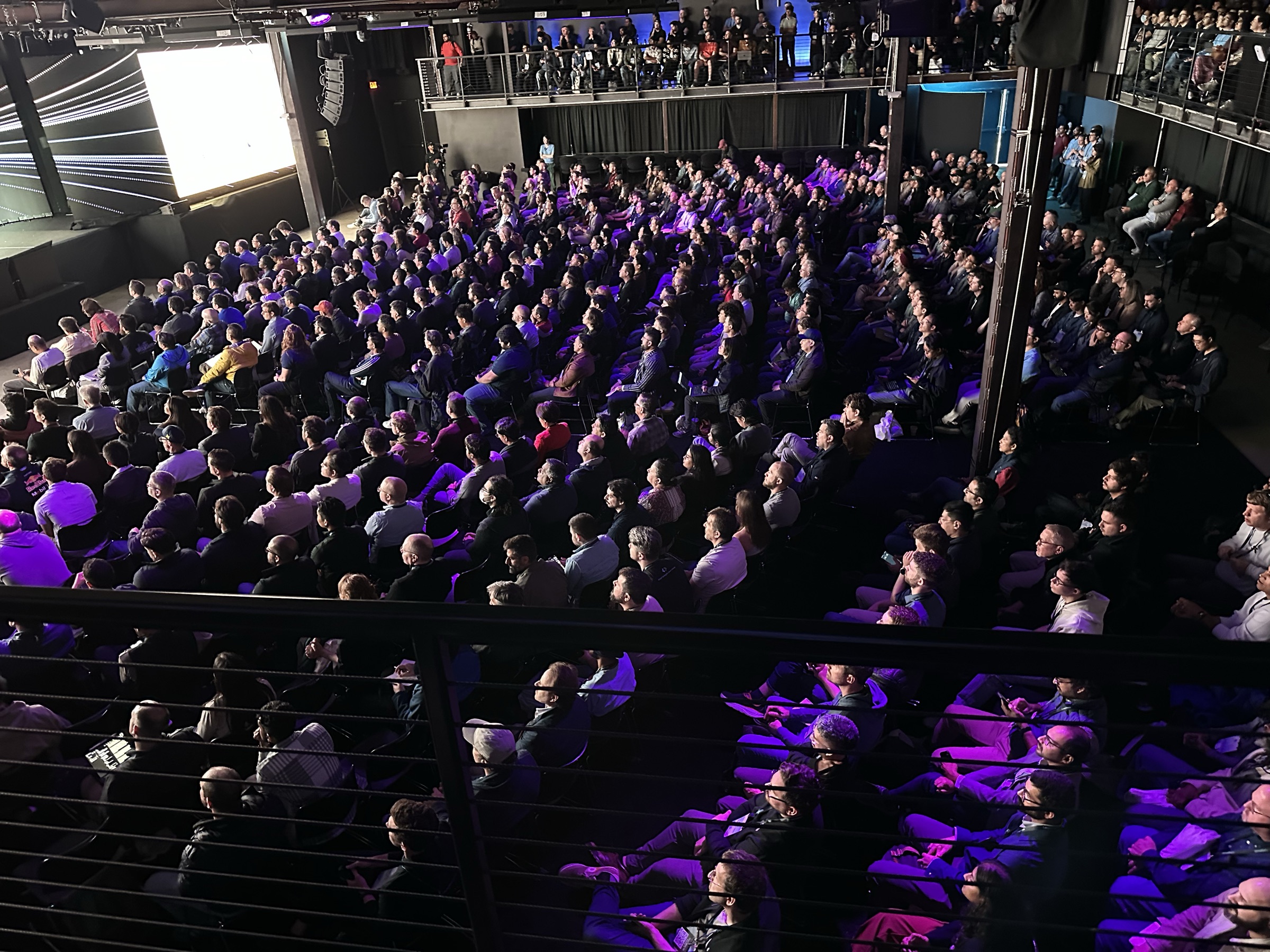 The Interrupt 2026 audience filling the floor, seen from the balcony